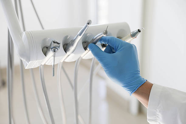 Professional Tooth Extraction technician working in Beverly Hills, TX